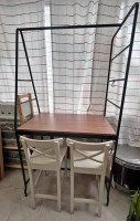 Tall table with storage ladde