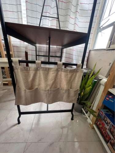 Tall table with storage ladde