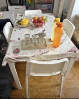 Table chairs and chest of drawers