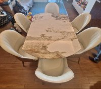 EXTENDABLE ROTATING DINING TABLE WITH CHAIRS