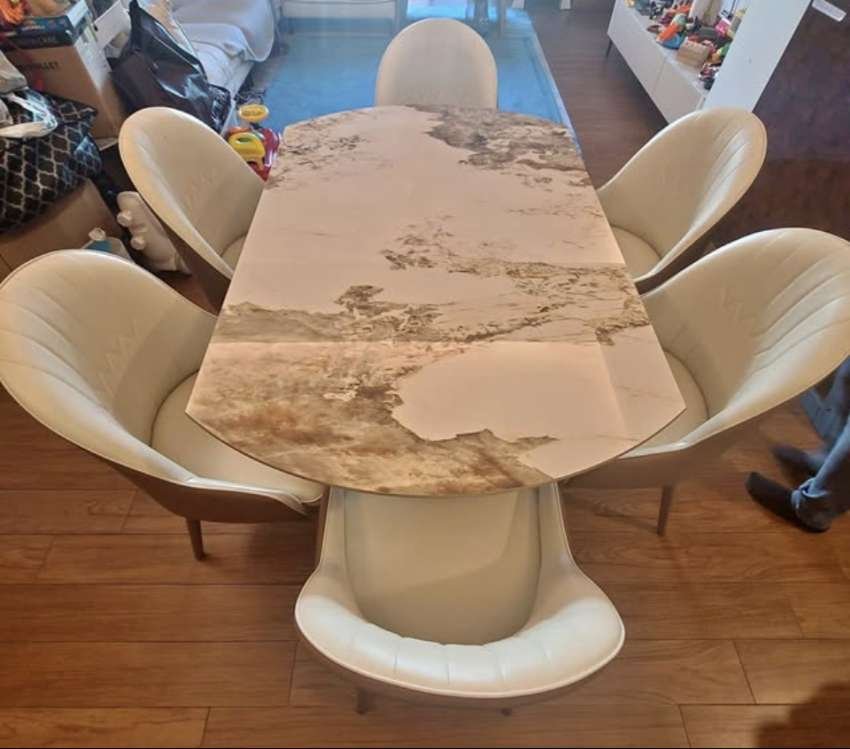 EXTENDABLE ROTATING DINING TABLE WITH CHAIRS
