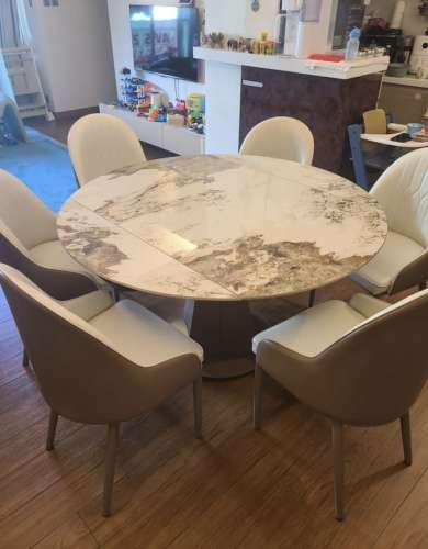 EXTENDABLE ROTATING DINING TABLE WITH CHAIRS