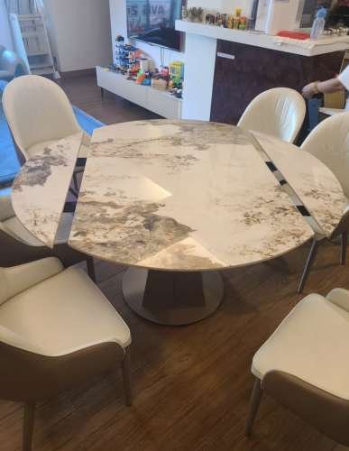 EXTENDABLE ROTATING DINING TABLE WITH CHAIRS